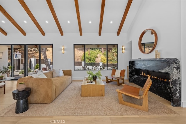 721 Wilson Ct, Burbank, CA 91501 - living area featuring a premium fireplace, healthy amount of natural light, wood finished floors, recessed lighting, and baseboards