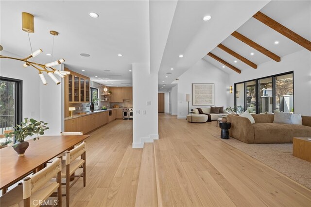 721 Wilson Ct, Burbank, CA 91501 - living room featuring recessed lighting, beam ceiling, light wood-style flooring, high vaulted ceiling, and a chandelier