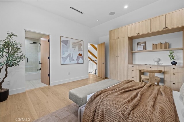 721 Wilson Ct, Burbank, CA 91501 - bedroom featuring light wood-type flooring, baseboards, and connected bathroom