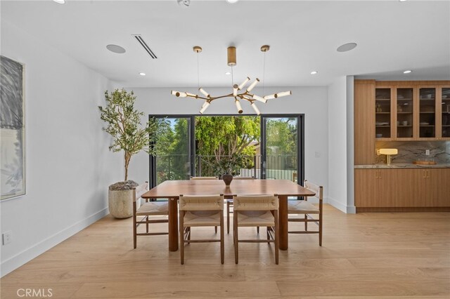 721 Wilson Ct, Burbank, CA 91501 - dining area featuring a chandelier, light wood-style floors, recessed lighting, and baseboards