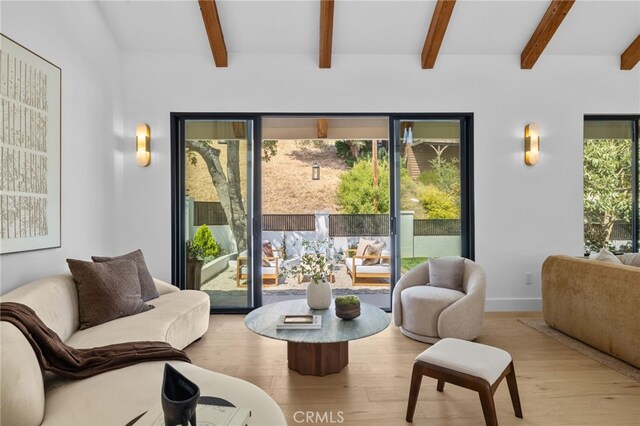 721 Wilson Ct, Burbank, CA 91501 - living room featuring wood finished floors, beamed ceiling, and baseboards