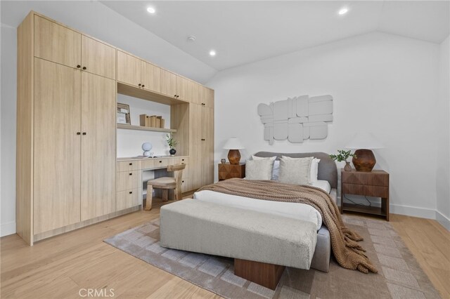 721 Wilson Ct, Burbank, CA 91501 - bedroom with light wood-style floors, recessed lighting, vaulted ceiling, and baseboards