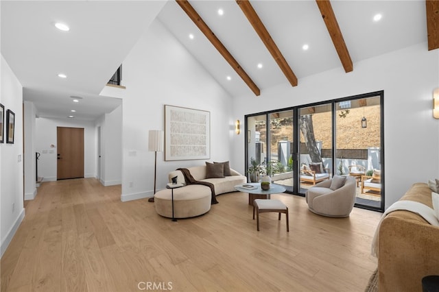 721 Wilson Ct, Burbank, CA 91501 - living room with high vaulted ceiling, beam ceiling, light wood finished floors, recessed lighting, and baseboards