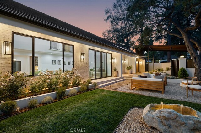 721 Wilson Ct, Burbank, CA 91501 - back of property featuring an outdoor living space and a patio