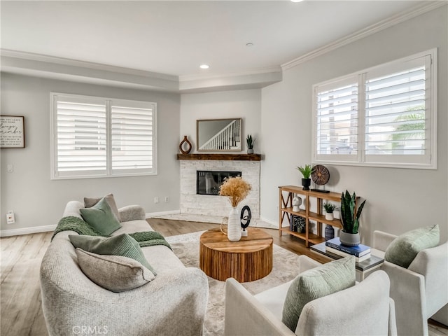 2223 Grant Ave Unit C, Redondo Beach, CA 90278 - living room featuring crown molding, wood finished floors, a stone fireplace, baseboards, and recessed lighting