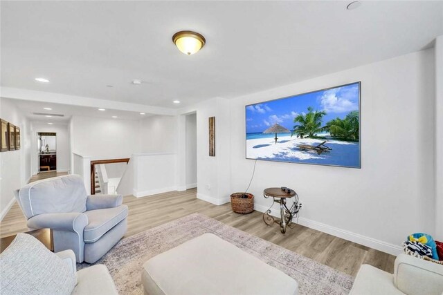 34253 Mazarine Dr, Temecula, CA 92592 - living room featuring wood finished floors, baseboards, stairway, and recessed lighting