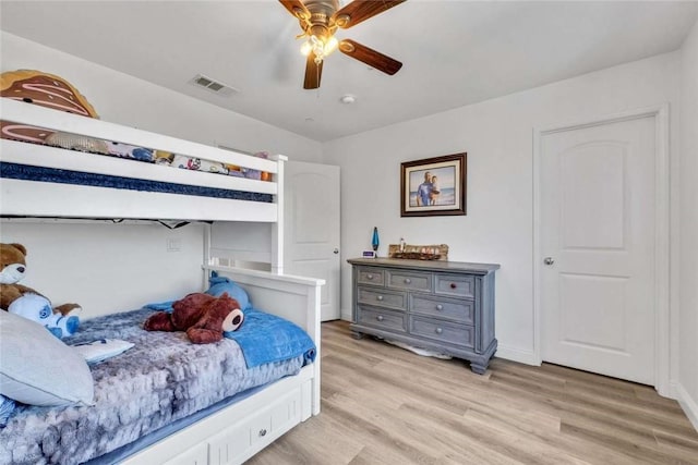 34253 Mazarine Dr, Temecula, CA 92592 - bedroom with light wood-type flooring, ceiling fan, and baseboards