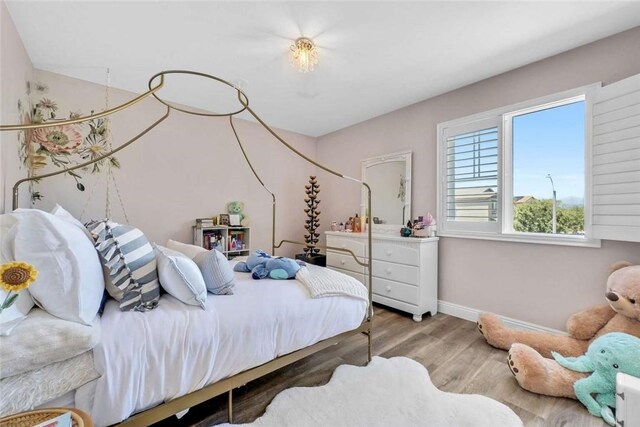 34253 Mazarine Dr, Temecula, CA 92592 - bedroom featuring wood finished floors and baseboards