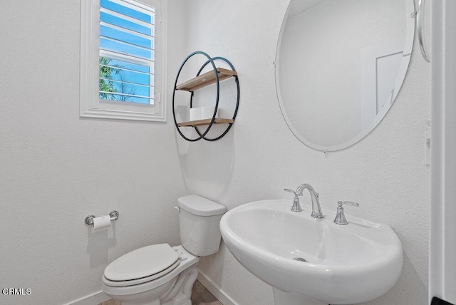 17065 Laurel Rd, Morgan Hill, CA 95037 - half bathroom with a sink and baseboards