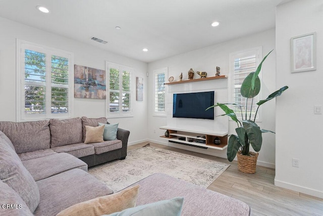 17065 Laurel Rd, Morgan Hill, CA 95037 - living room featuring wood finished floors and recessed lighting