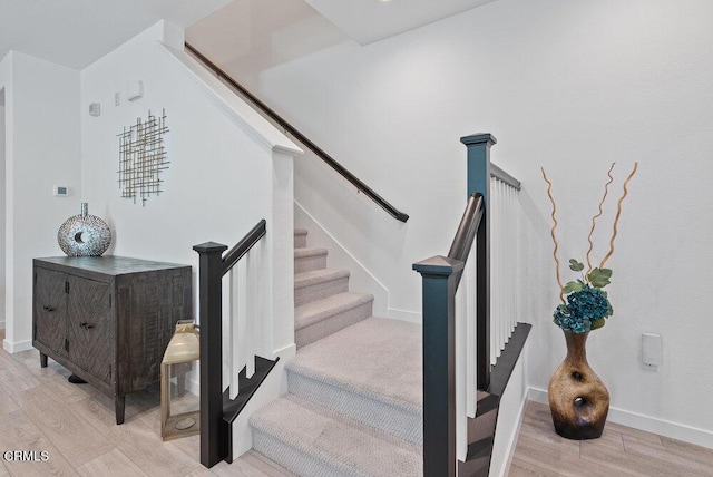 17065 Laurel Rd, Morgan Hill, CA 95037 - stairs with wood finished floors and baseboards
