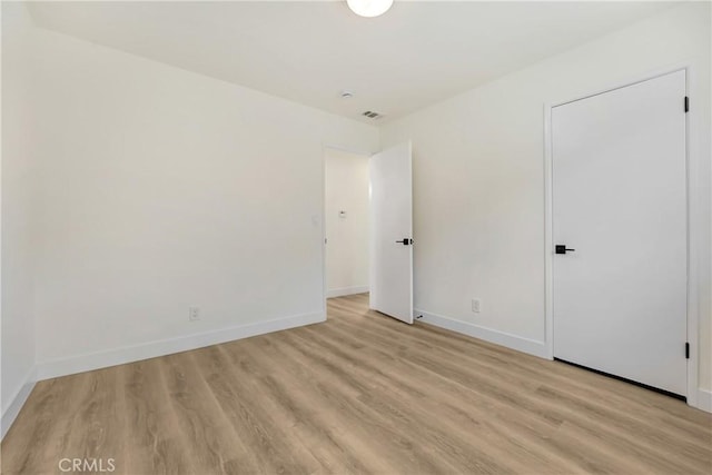2380 Westcott Ave, Monterey Park, CA 91754 - unfurnished bedroom featuring light wood-type flooring and baseboards
