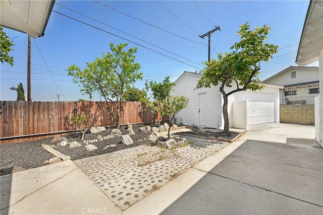 2380 Westcott Ave, Monterey Park, CA 91754 - view of patio featuring an outbuilding and driveway