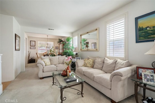 31332 Gatehouse Ct, Murrieta, CA 92563 - living room featuring a chandelier and carpet flooring