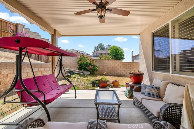 31332 Gatehouse Ct, Murrieta, CA 92563 - fenced backyard with an outdoor hangout area, a patio, and ceiling fan