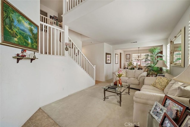 31332 Gatehouse Ct, Murrieta, CA 92563 - carpeted living area featuring stairway and a chandelier