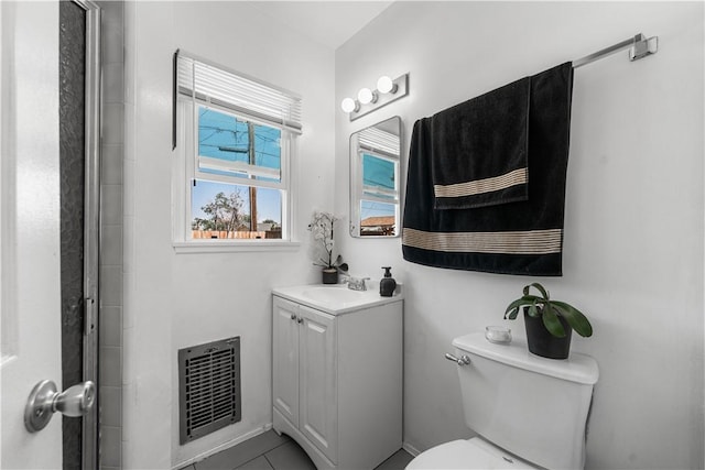 44246 Foxton Ave, Lancaster, CA 93535 - bathroom featuring toilet, vanity, and tile patterned flooring