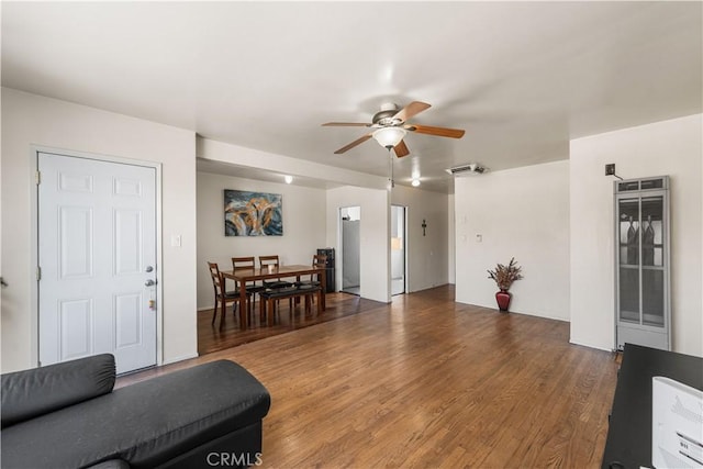 44246 Foxton Ave, Lancaster, CA 93535 - living area featuring ceiling fan, wood finished floors, and beverage cooler