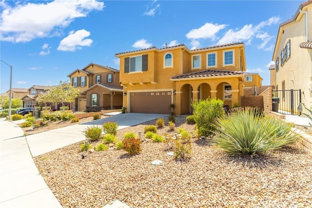 37436 Umbrella, Palmdale, CA 93551 - mediterranean / spanish house featuring stucco siding, an attached garage, driveway, a tiled roof, and a residential view