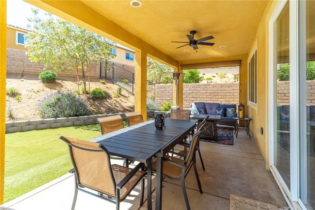 37436 Umbrella, Palmdale, CA 93551 - fenced backyard featuring a patio area, a ceiling fan, an outdoor living space, and outdoor dining space
