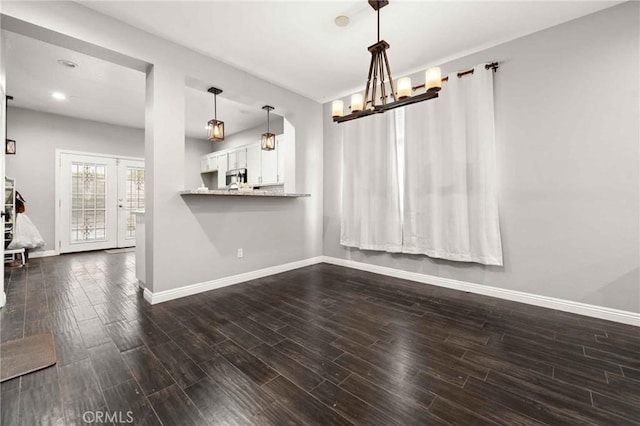 5191 Westerfield St, Jurupa Valley, CA 92509 - unfurnished dining area with dark wood-type flooring, a chandelier, and recessed lighting
