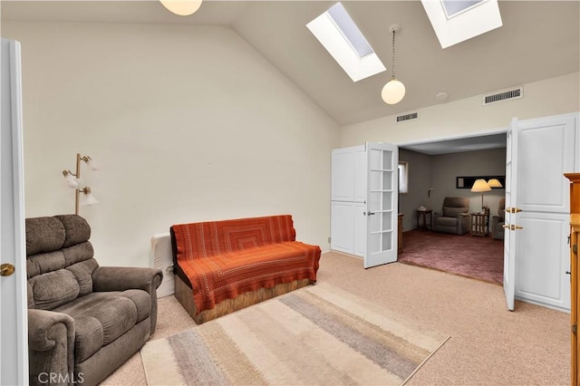 7608 Shawnee Trl, Yucca Valley, CA 92284 - sitting room featuring a skylight, light colored carpet, and high vaulted ceiling