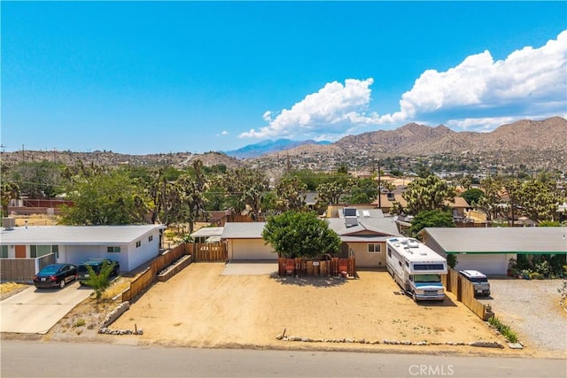 7608 Shawnee Trl, Yucca Valley, CA 92284 - mountain view with nearby suburban area