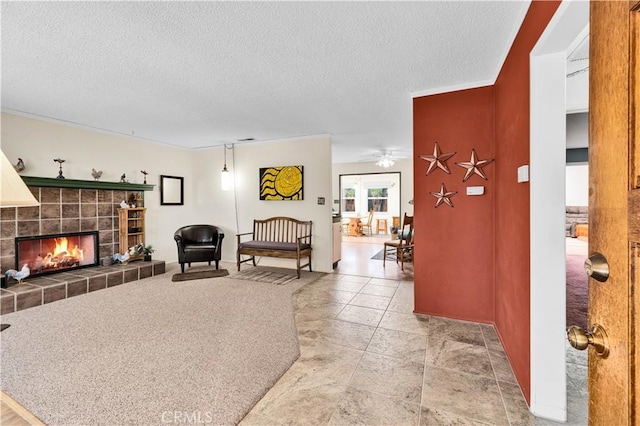 7608 Shawnee Trl, Yucca Valley, CA 92284 - living area with a textured ceiling, a fireplace, and ceiling fan