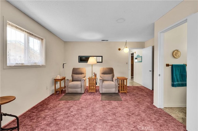 7608 Shawnee Trl, Yucca Valley, CA 92284 - sitting room with carpet and a textured ceiling