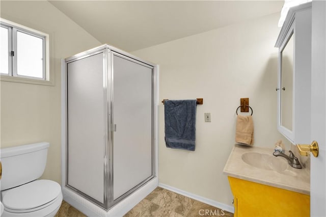 7608 Shawnee Trl, Yucca Valley, CA 92284 - bathroom with vanity, a stall shower, toilet, and baseboards
