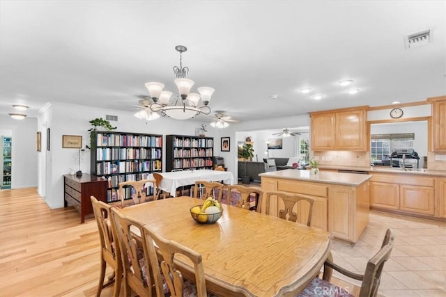 1626 S Boulder Ave, Ontario, CA 91762 - dining area with a chandelier, a ceiling fan, recessed lighting, and ornamental molding