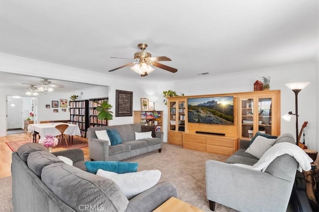 1626 S Boulder Ave, Ontario, CA 91762 - living area with ceiling fan, crown molding, and light carpet