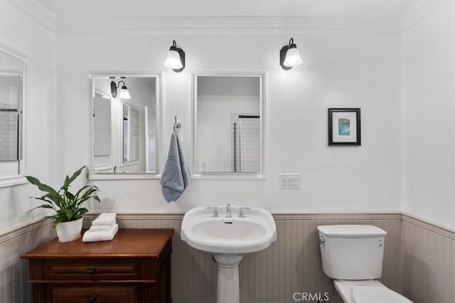 1626 S Boulder Ave, Ontario, CA 91762 - bathroom with toilet, a wainscoted wall, and crown molding