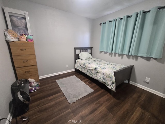 1212 Gen Ct, Barstow, CA 92311 - bedroom with wood finished floors and baseboards