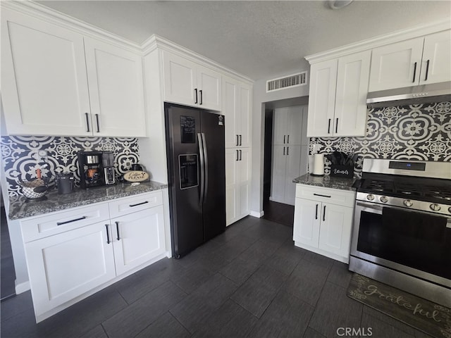 1212 Gen Ct, Barstow, CA 92311 - kitchen featuring black fridge with ice dispenser, stainless steel gas range oven, under cabinet range hood, white cabinets, and backsplash