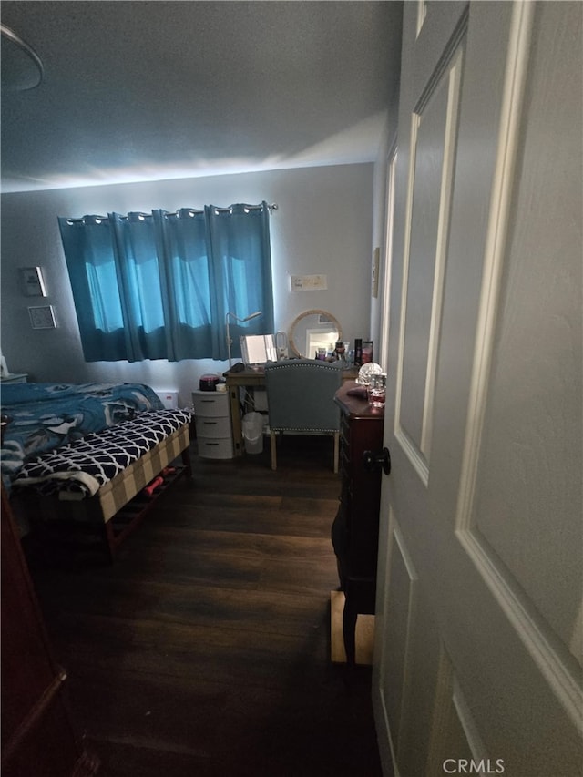 1212 Gen Ct, Barstow, CA 92311 - bedroom with dark wood finished floors