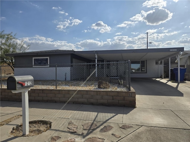 1212 Gen Ct, Barstow, CA 92311 - manufactured / mobile home with driveway and a carport