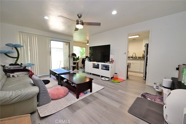 121 E Live Oak St, San Gabriel, CA 91776 - living room with light wood-type flooring, a ceiling fan, recessed lighting, and baseboards