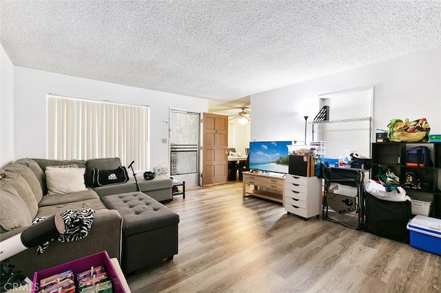 121 E Live Oak St, San Gabriel, CA 91776 - living area featuring wood finished floors, ceiling fan, and a textured ceiling