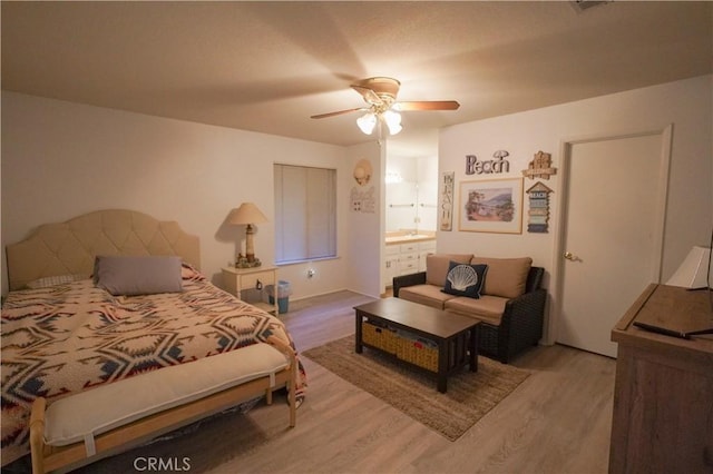 5030 Cardiff Ln, Atwater, CA 95301 - bedroom featuring wood finished floors, ceiling fan, and ensuite bath