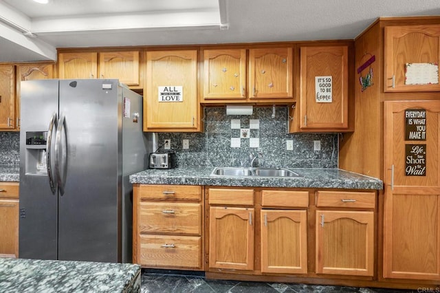 1518 Goldrush Way, Oceanside, CA 92057 - kitchen featuring stainless steel fridge, brown cabinets, and tasteful backsplash