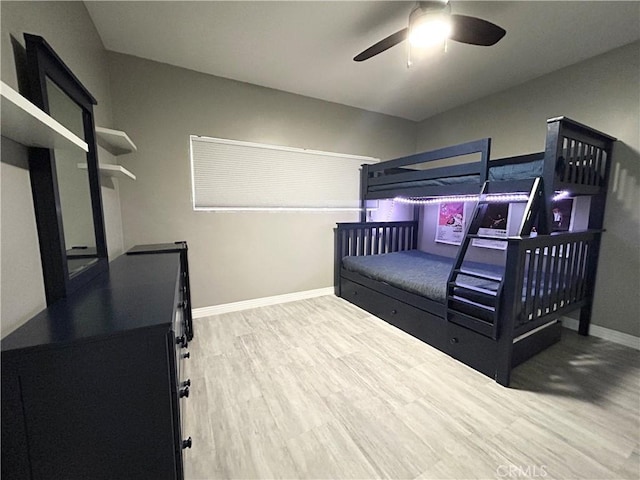 6008 Amos Ave, Lakewood, CA 90712 - bedroom with wood finished floors and a ceiling fan