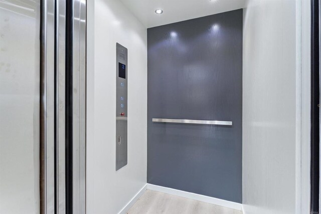 19 Gateview Dr, Fallbrook, CA 92028 - elevator with wood finished floors and baseboards