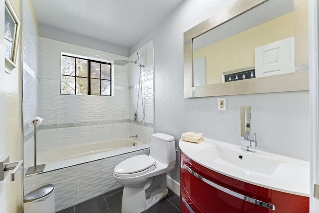 19 Gateview Dr, Fallbrook, CA 92028 - bathroom with tiled shower / bath combo, toilet, tile patterned flooring, vanity, and a textured wall