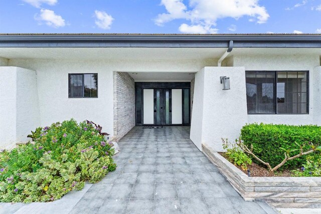 19 Gateview Dr, Fallbrook, CA 92028 - property entrance with stucco siding and french doors