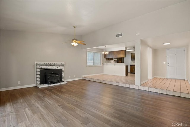 1018 Greenwich Dr, Chico, CA 95926 - unfurnished living room featuring ceiling fan, wood finished floors, and baseboards
