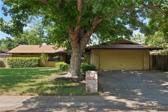 1018 Greenwich Dr, Chico, CA 95926 - ranch-style house with driveway and a garage