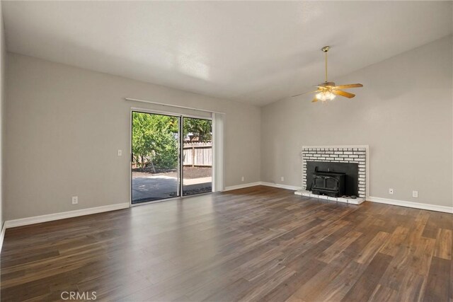 1018 Greenwich Dr, Chico, CA 95926 - unfurnished living room featuring dark wood-type flooring, a ceiling fan, and baseboards