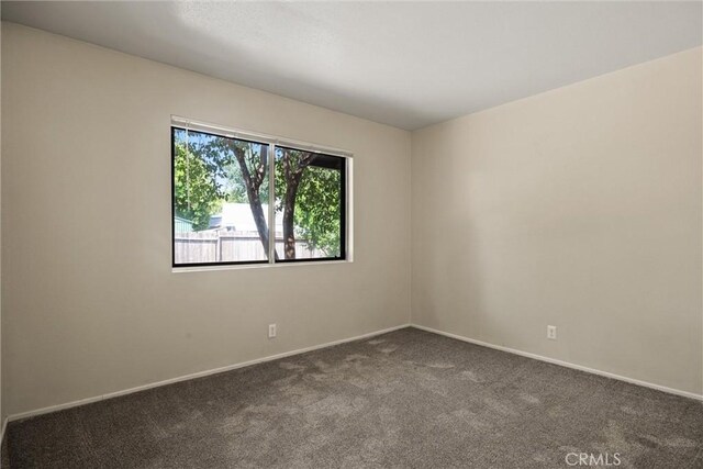 1018 Greenwich Dr, Chico, CA 95926 - spare room with carpet flooring and baseboards