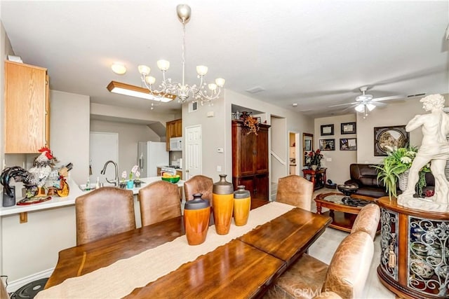 1251 Pepperwood Ct, Carson, CA 90746 - dining space featuring a chandelier and a ceiling fan